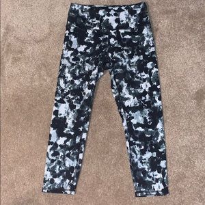 Dark green and black floral leggings; Capri length
